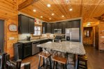 Fully Equipped Kitchen with Granite Countertops & Large Island